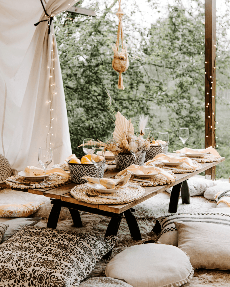 Boho picnic table with a group of guests